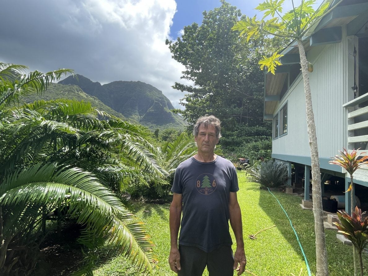 Man outside his home in Hawaii.
