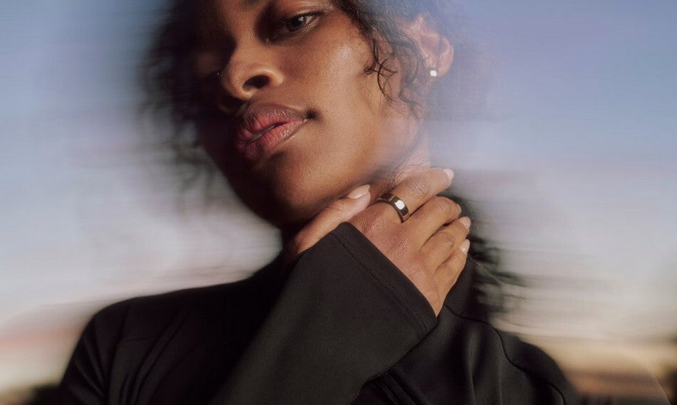 Photo of someone wearing an Oura Ring 5.