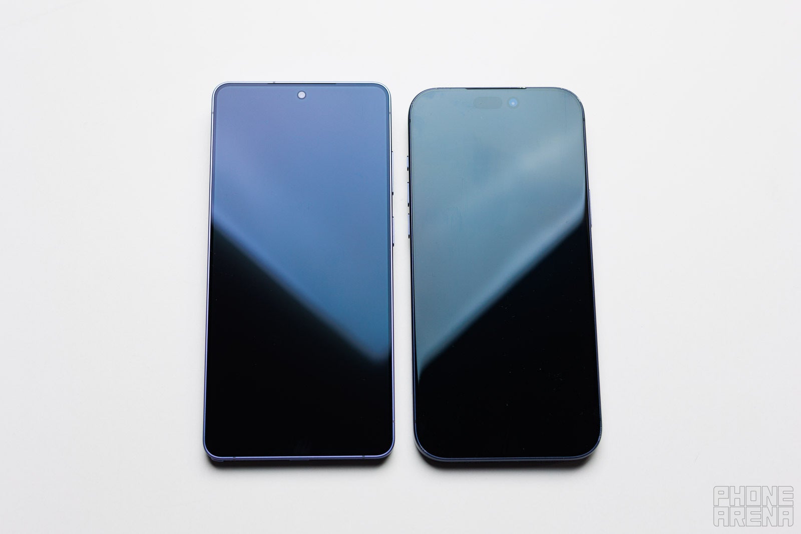 Galaxy S26 Ultra vs iPhone 17 Pro Max - screen off | Image by PhoneArena - Still the best? Galaxy S26 Ultra anti-reflection glass tested!