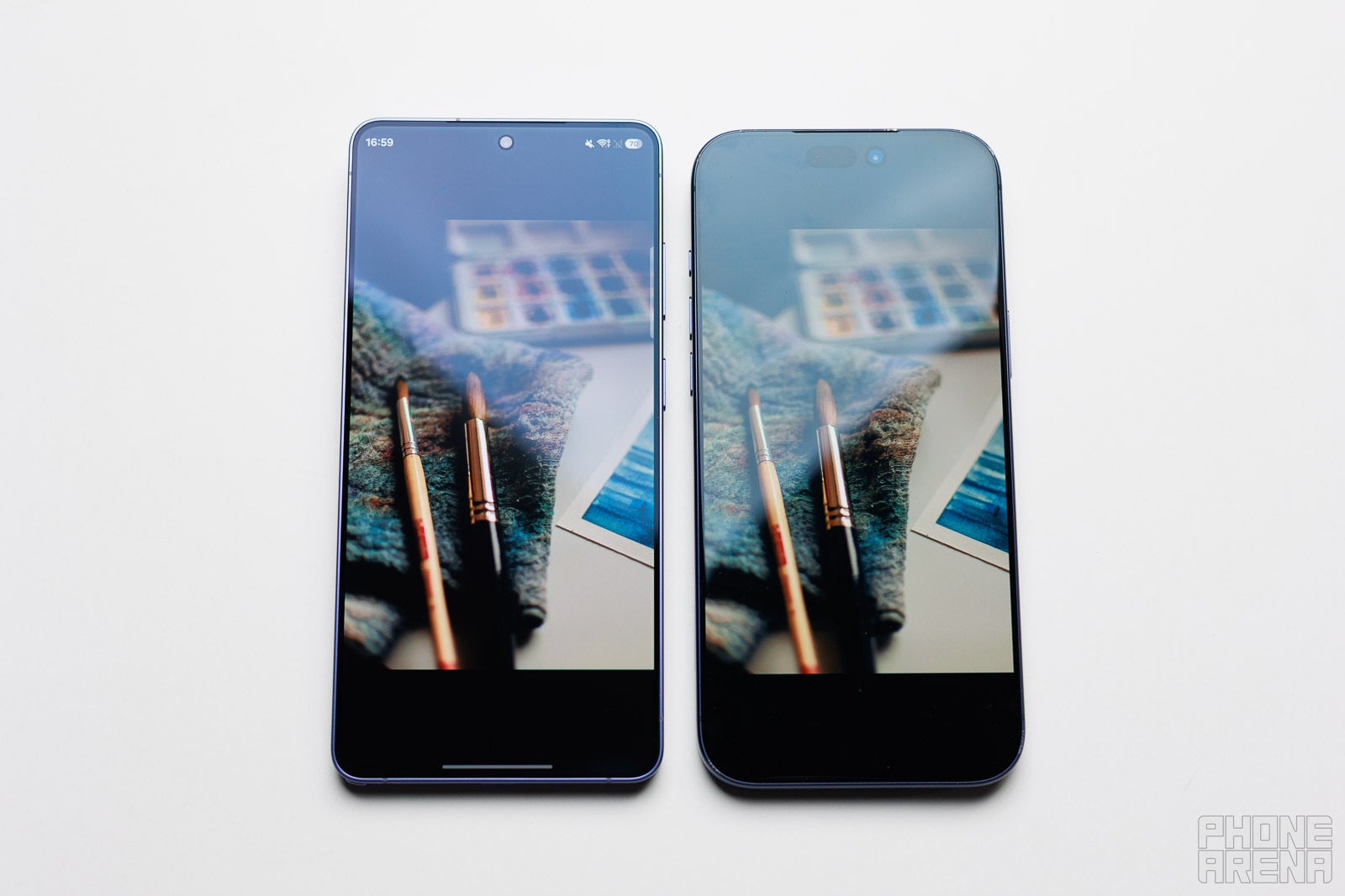 Galaxy S26 Ultra vs iPhone 17 Pro Max - screen on | Image by PhoneArena - Still the best? Galaxy S26 Ultra anti-reflection glass tested!