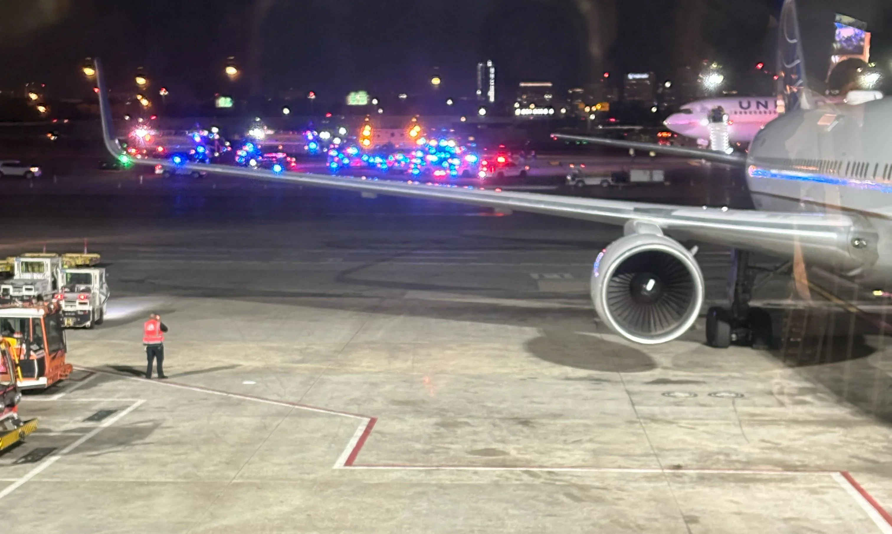 View from passenger window as flight returns to Newark.