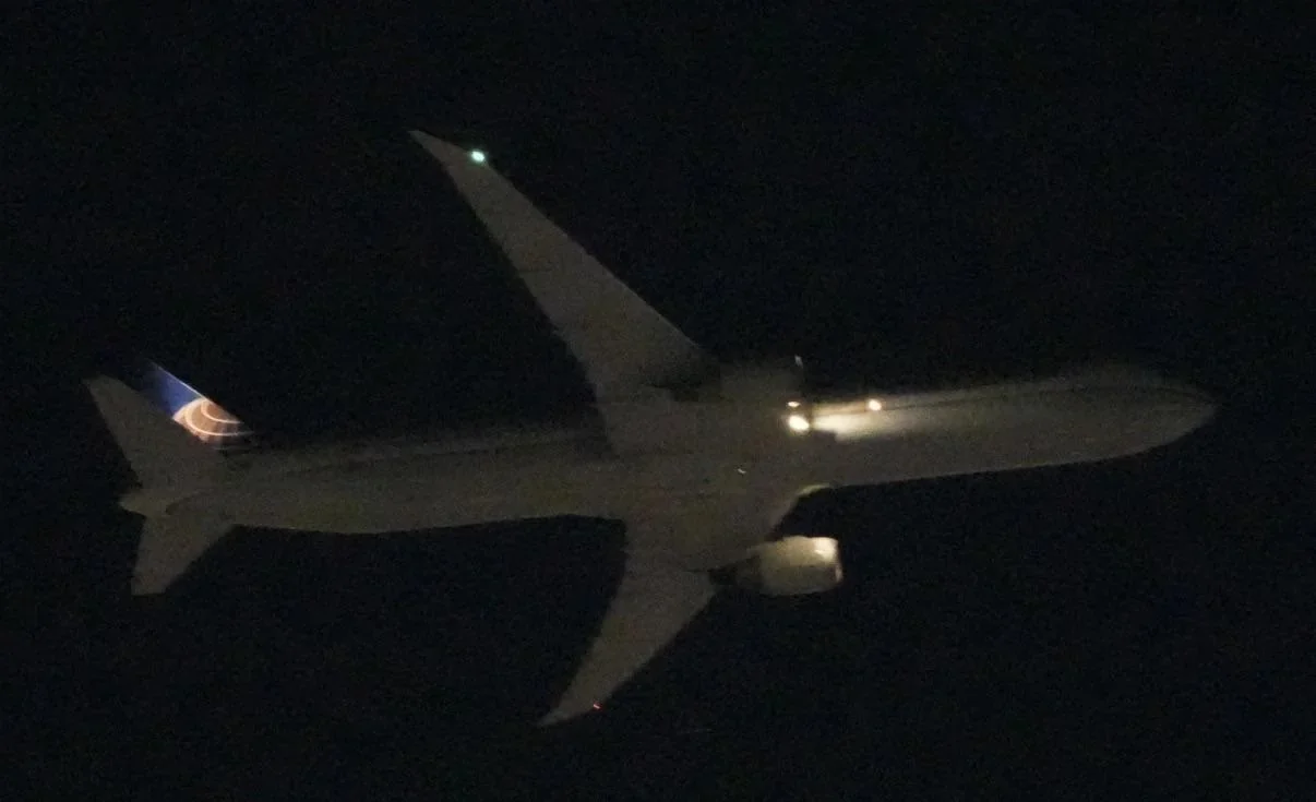 UAL flght 236 as seen from the ground flying back to Newark.