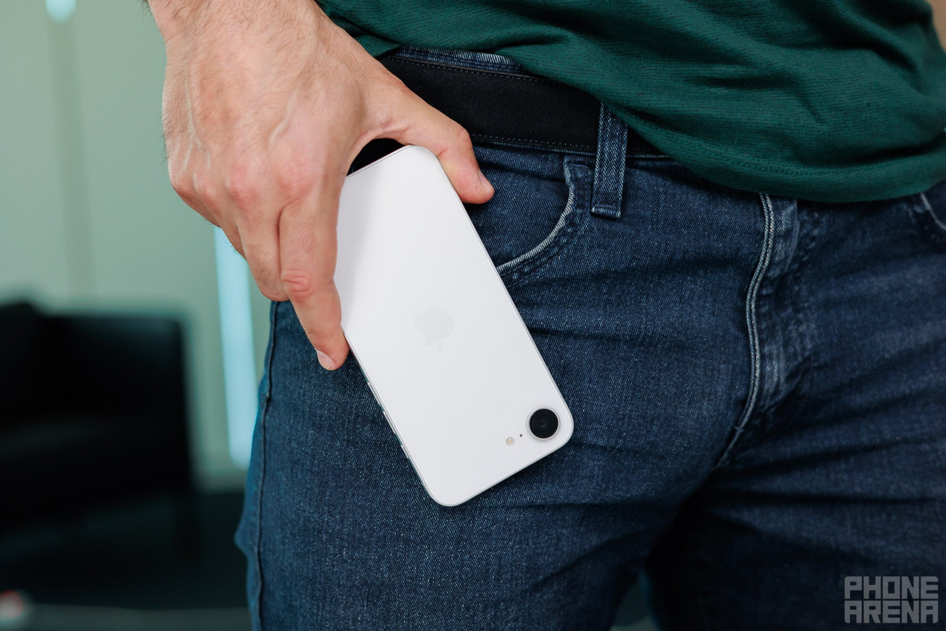 The iPhone 17e and pockets. | Image by PhoneArena - iPhone 17e Size Guide: Is a 6.1-inch phone big enough in 2026?