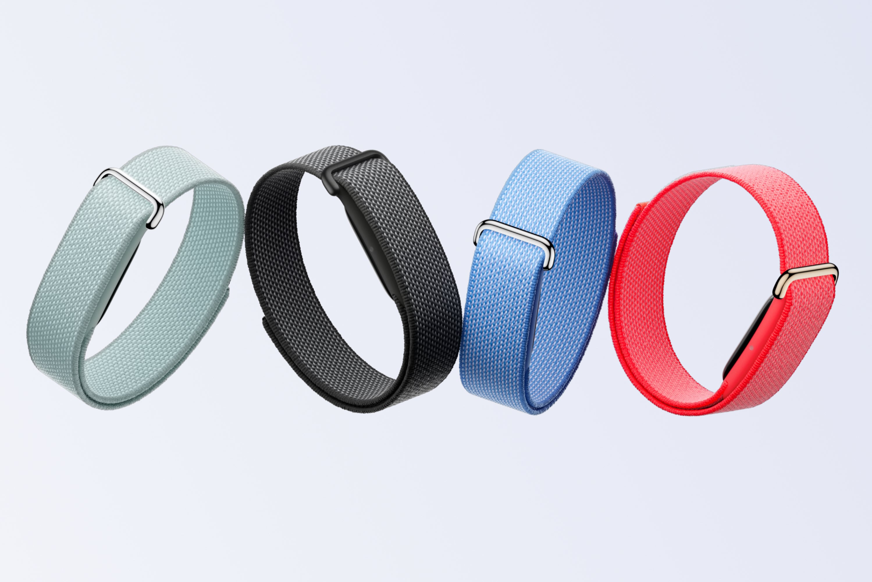 Four Google Fitbit Air Performance Loop bands in their available colors, arranged in a row.