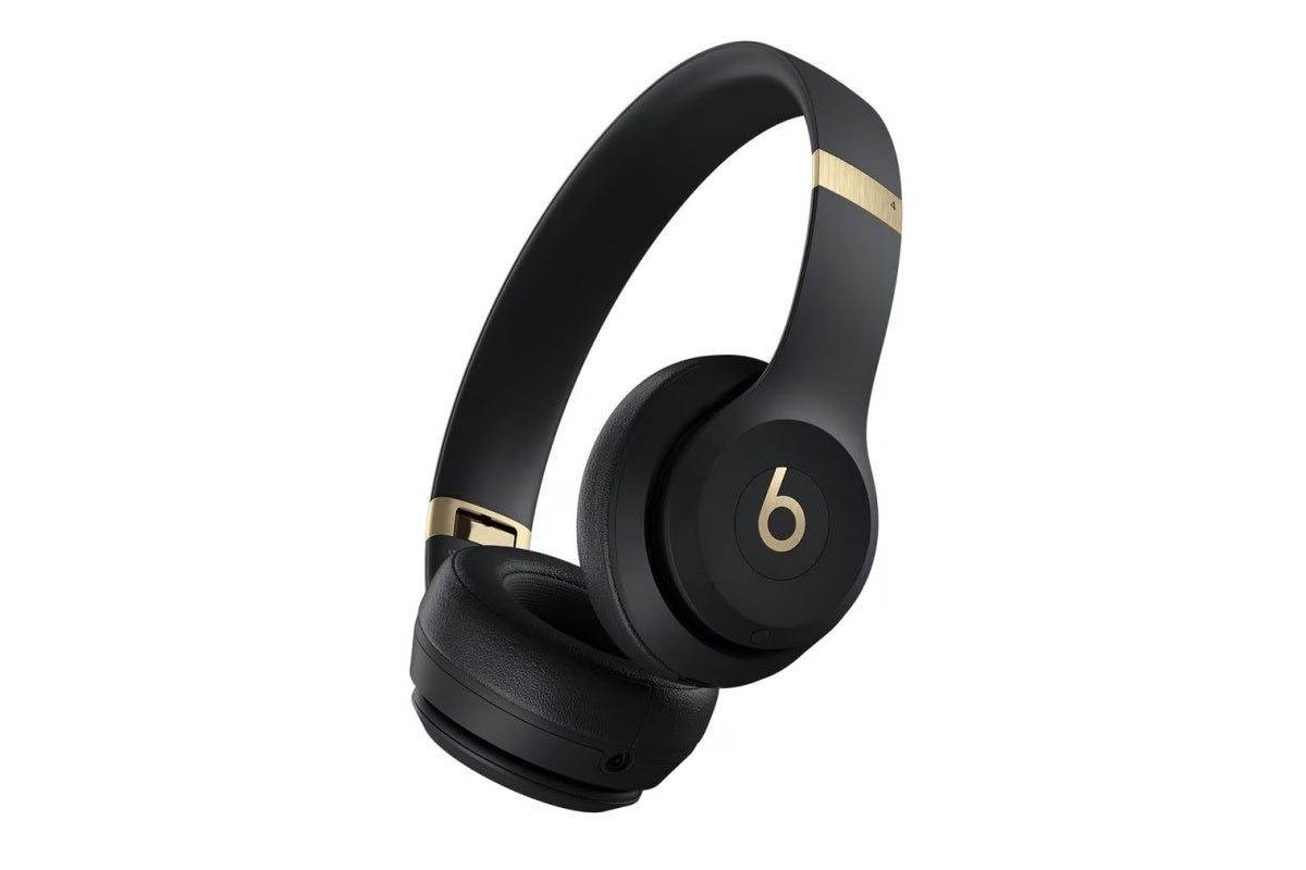 Beats Solo 4 headphones in black-and-gold color
