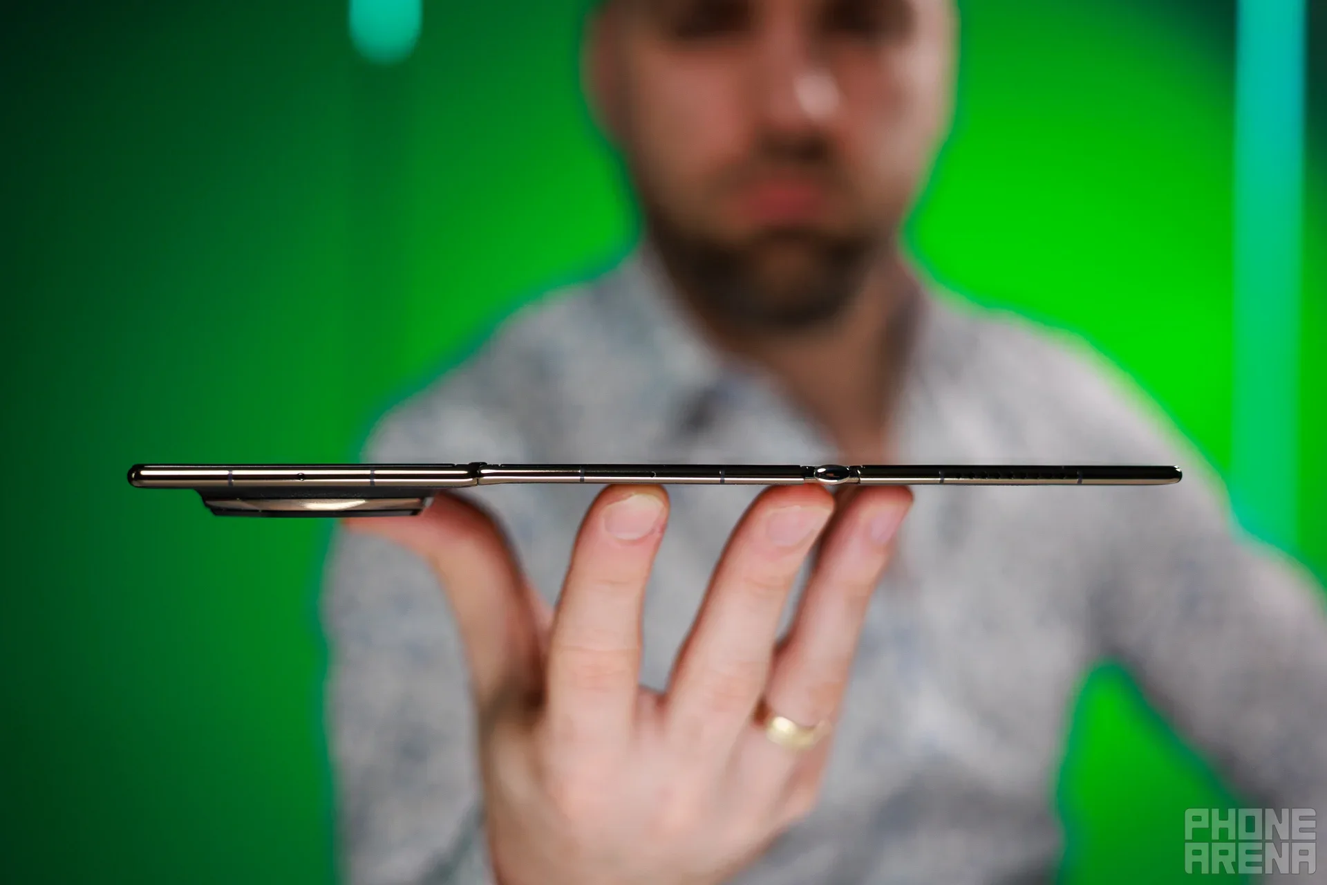 Huawei phone in hand.