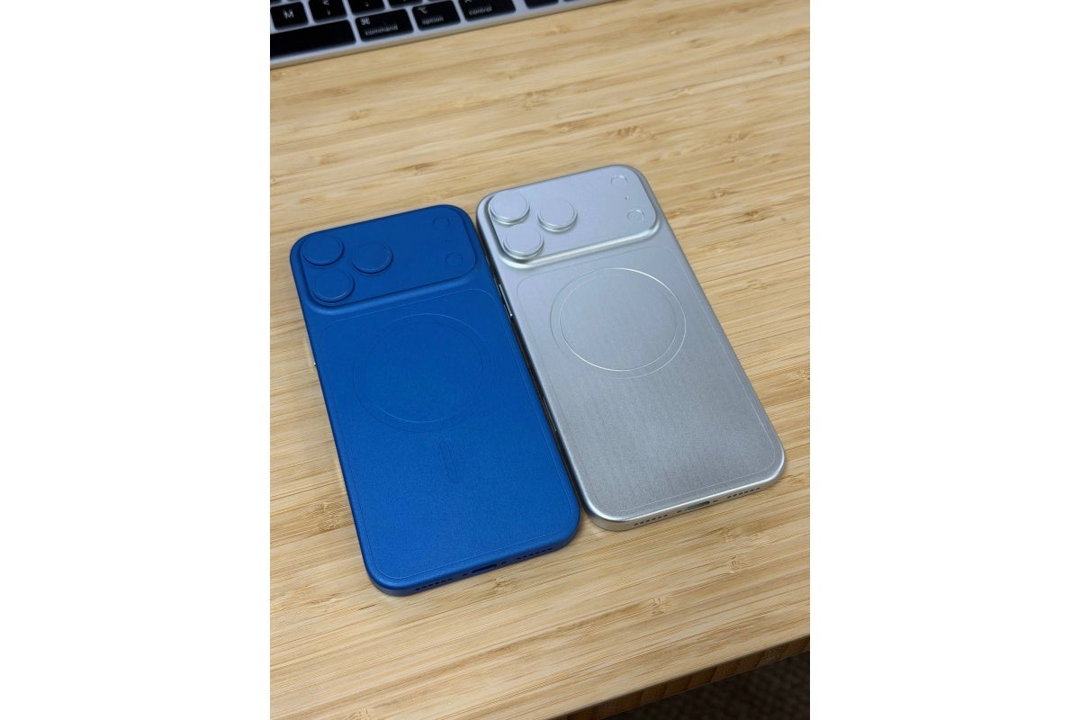 Side-by-side photo of iPhone 18 Pro Max and 17 Pro Max dummies