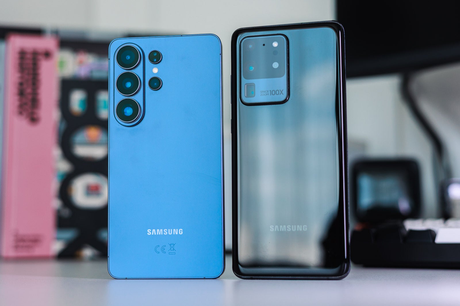 A blue and a black Galaxy S Ultra phones.