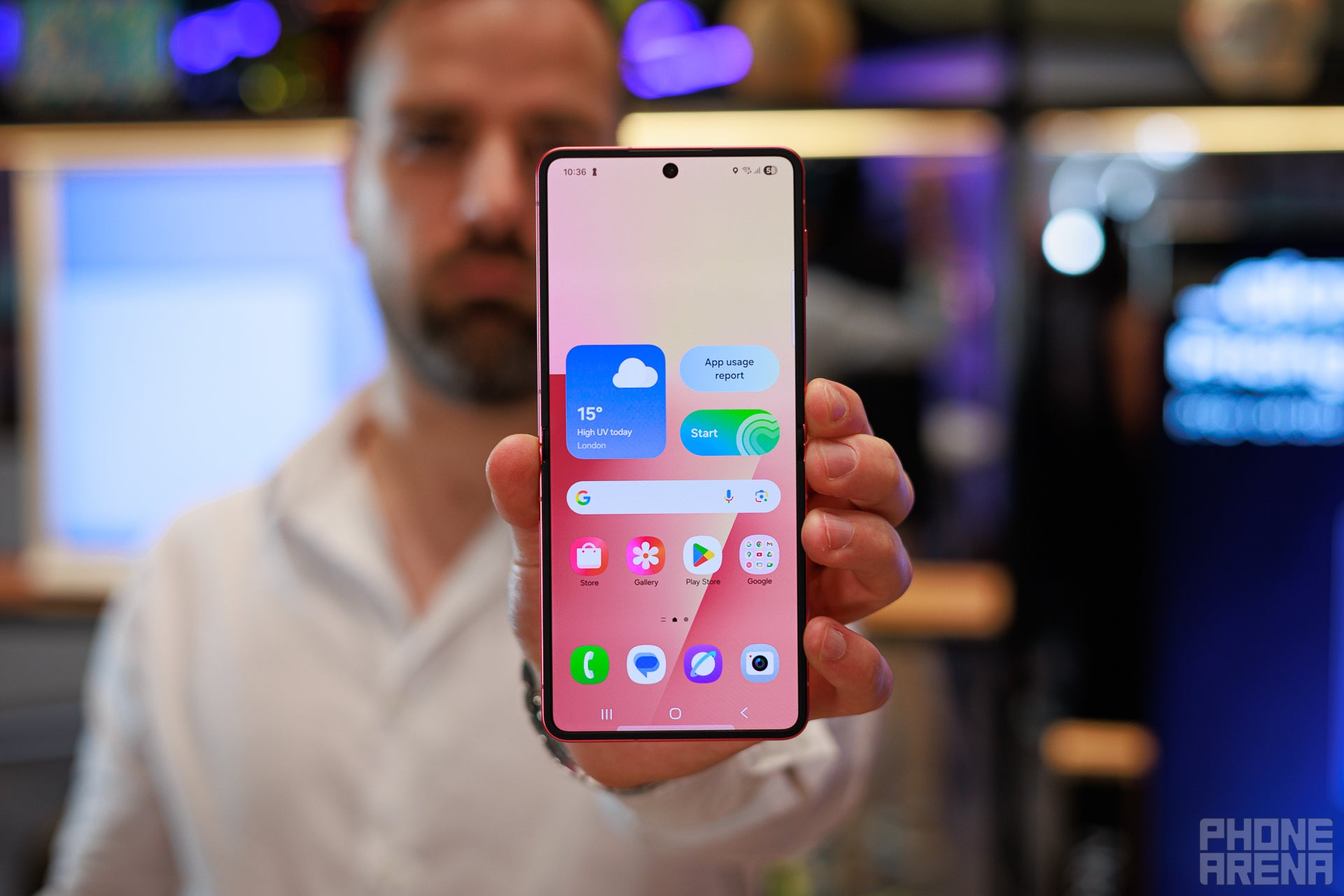 A man holding the Galaxy Z Flip 7 in his hand.