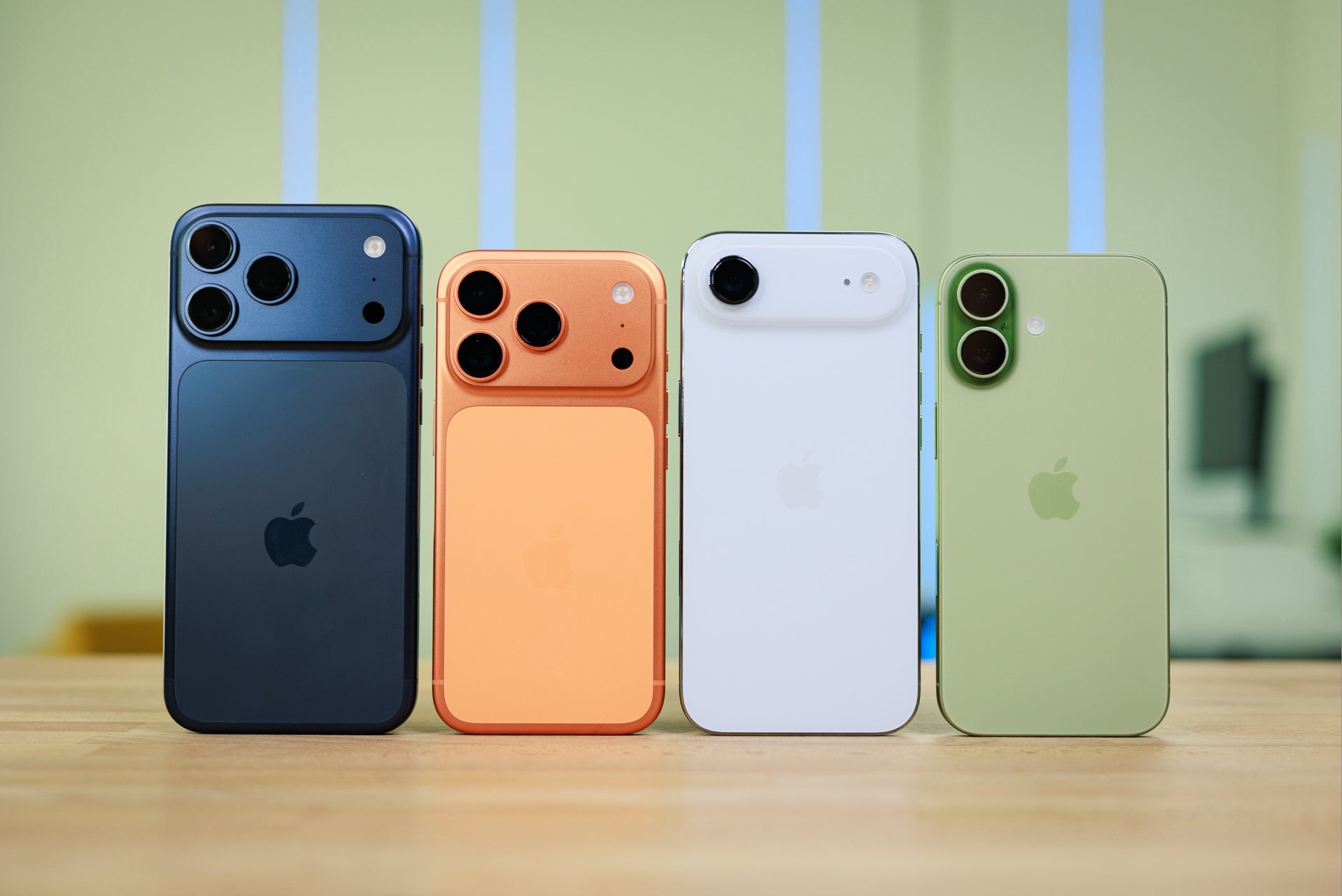 iPhone 17 family phones standing side by side