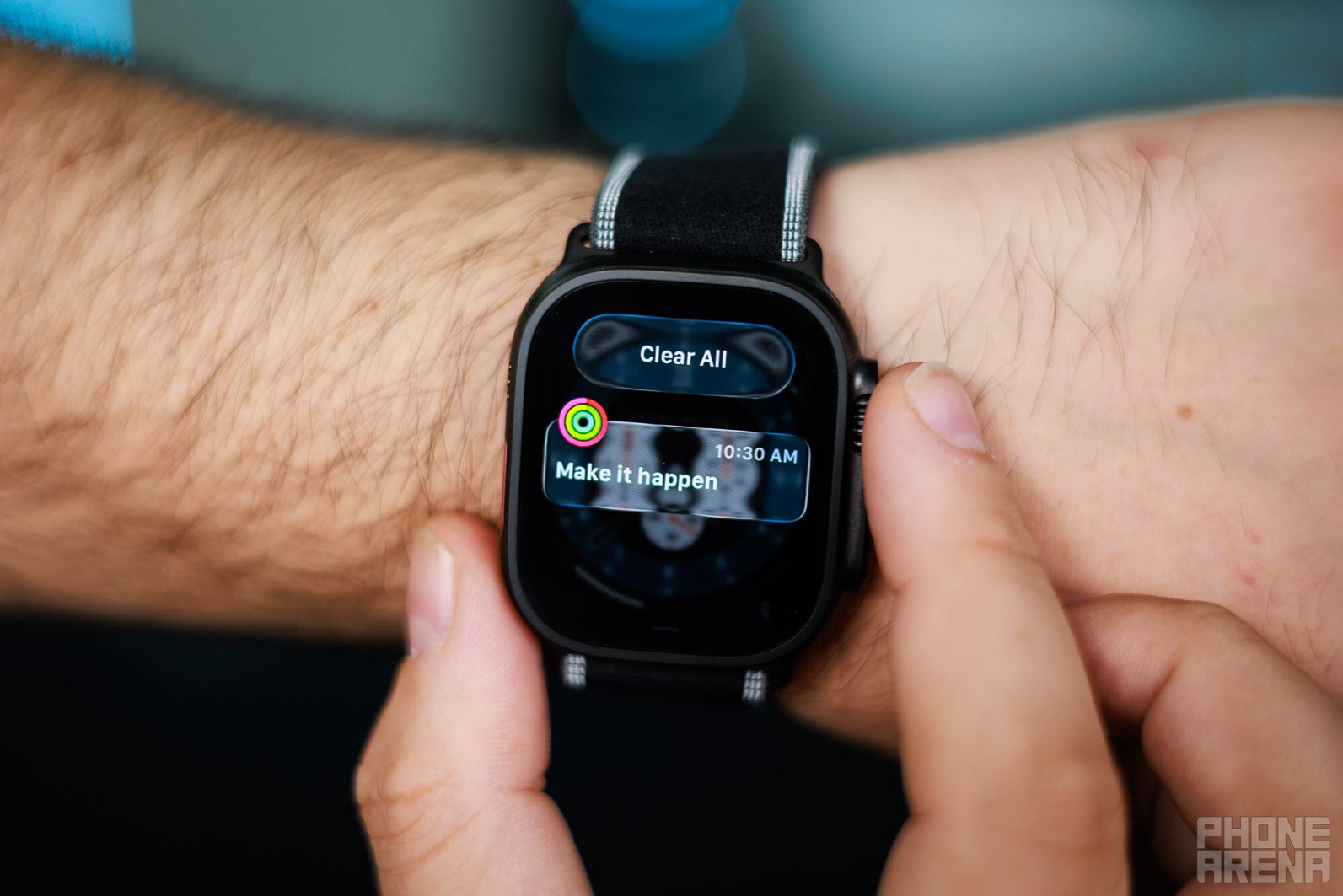 Apple Watch Ultra 3 on a wrist showing Activity rings
