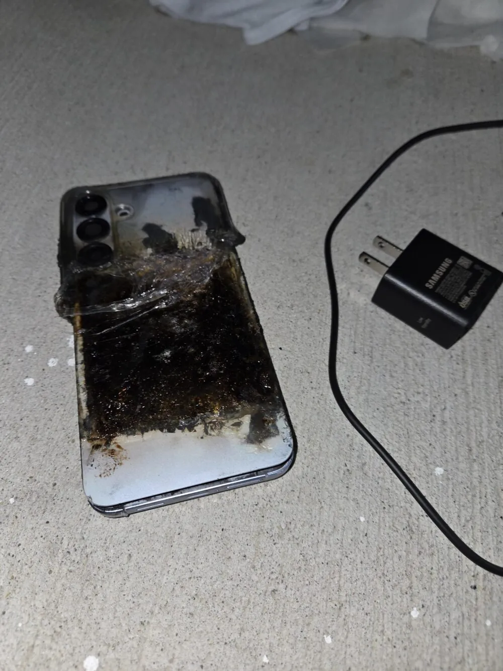 The burnt remains of the Galaxy S25 FE from the incident in Canada. | Image by Reddit user scoopofwei - Galaxy S26 explodes in owner's pocket, causing severe burns to hands and body