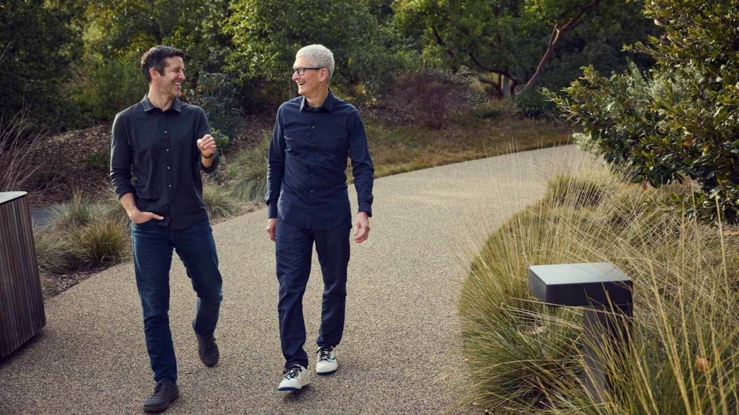 Tim Cook and John Ternus standing together at Apple Park