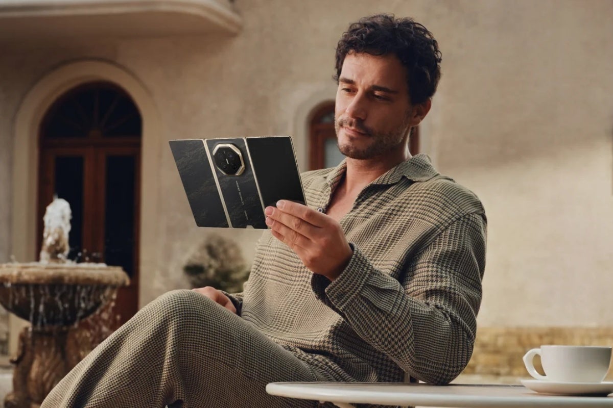 Huawei Mate XT 2 in a user's hand