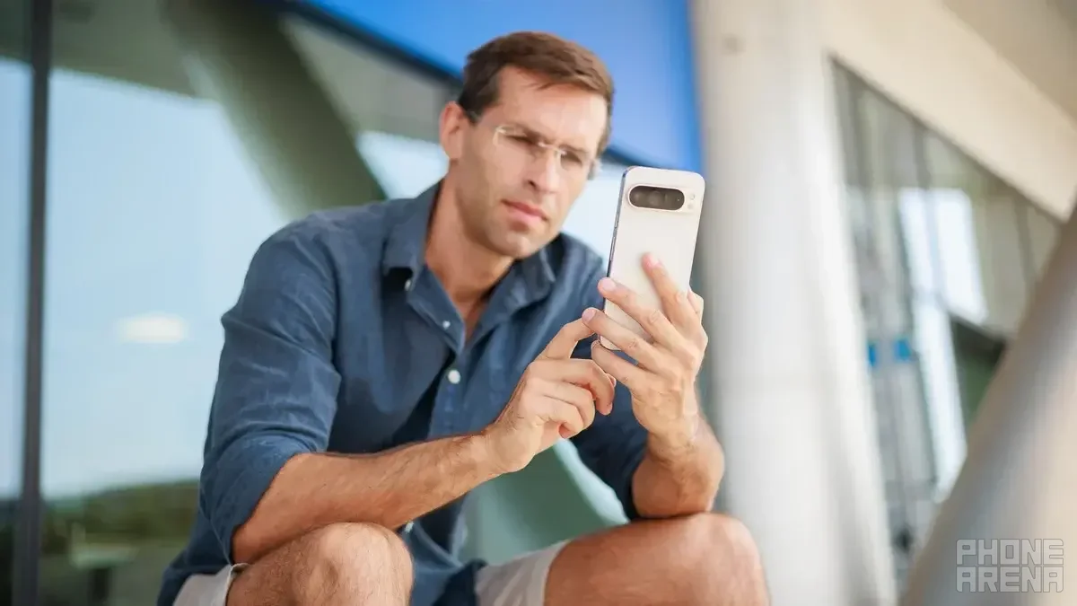 Man holding a phone.