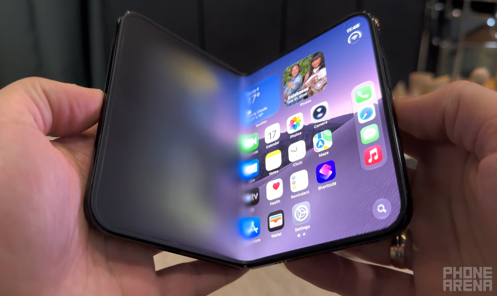 The iPhone Duo is easy to open, yet solid enough to stay in exactly the way you want it. | Image by PhoneArena - I tried Apple&rsquo;s iPhone Duo &ndash; Samsung should be worried