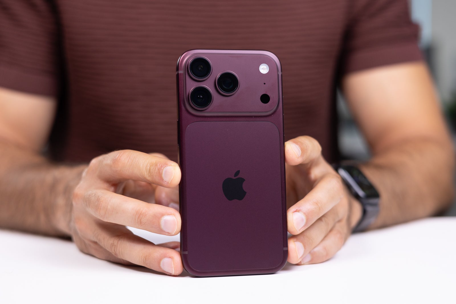 Image by PhoneArena - I love almost everything about the Burgundy iPhone 18 Pro &mdash; almost
