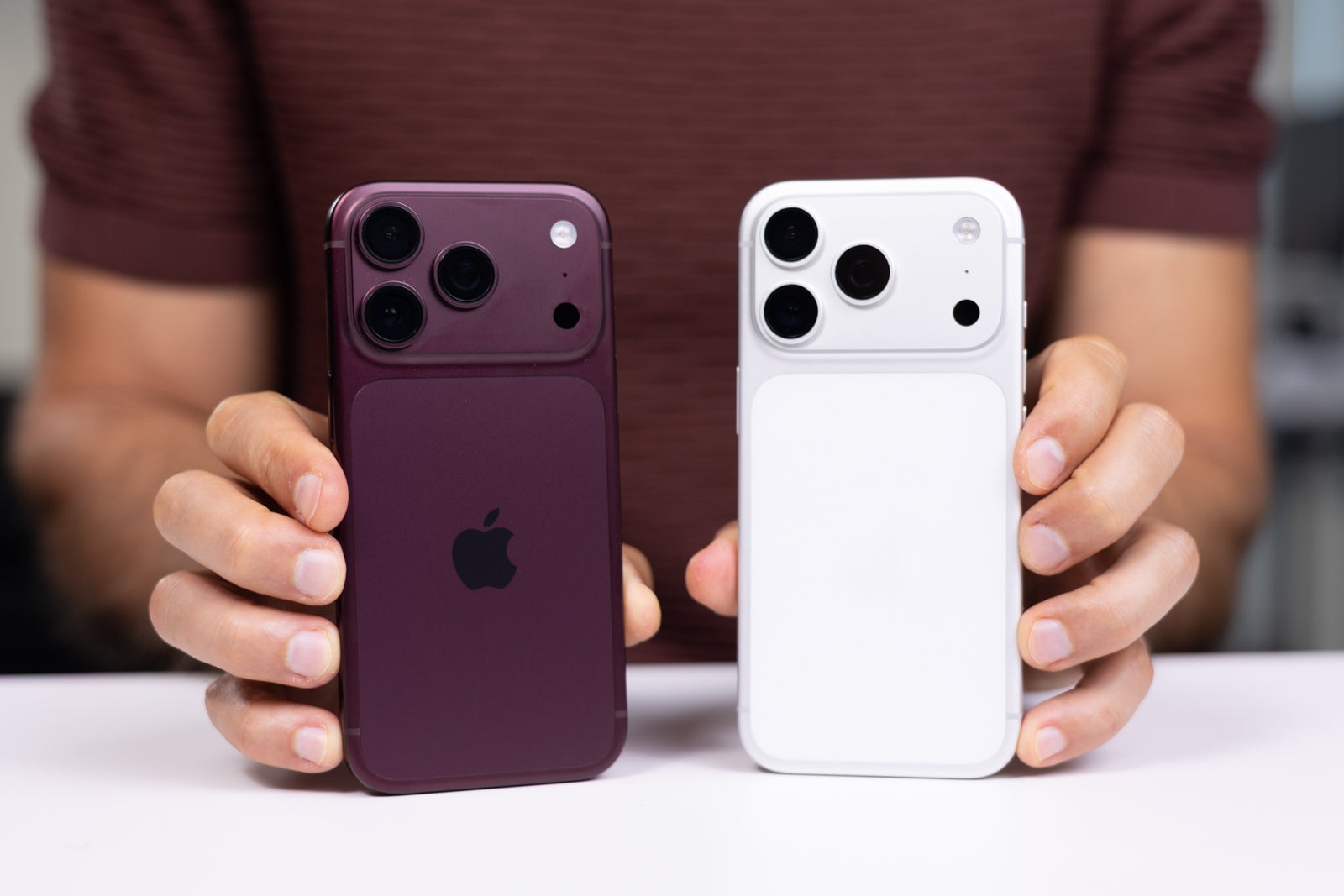 Image by PhoneArena - I love almost everything about the Burgundy iPhone 18 Pro &mdash; almost