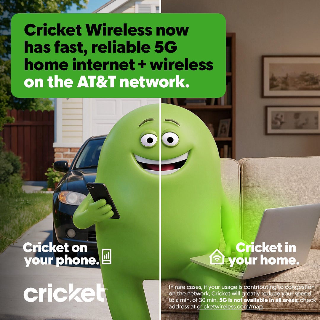 Cricket mascot using a phone and a laptop