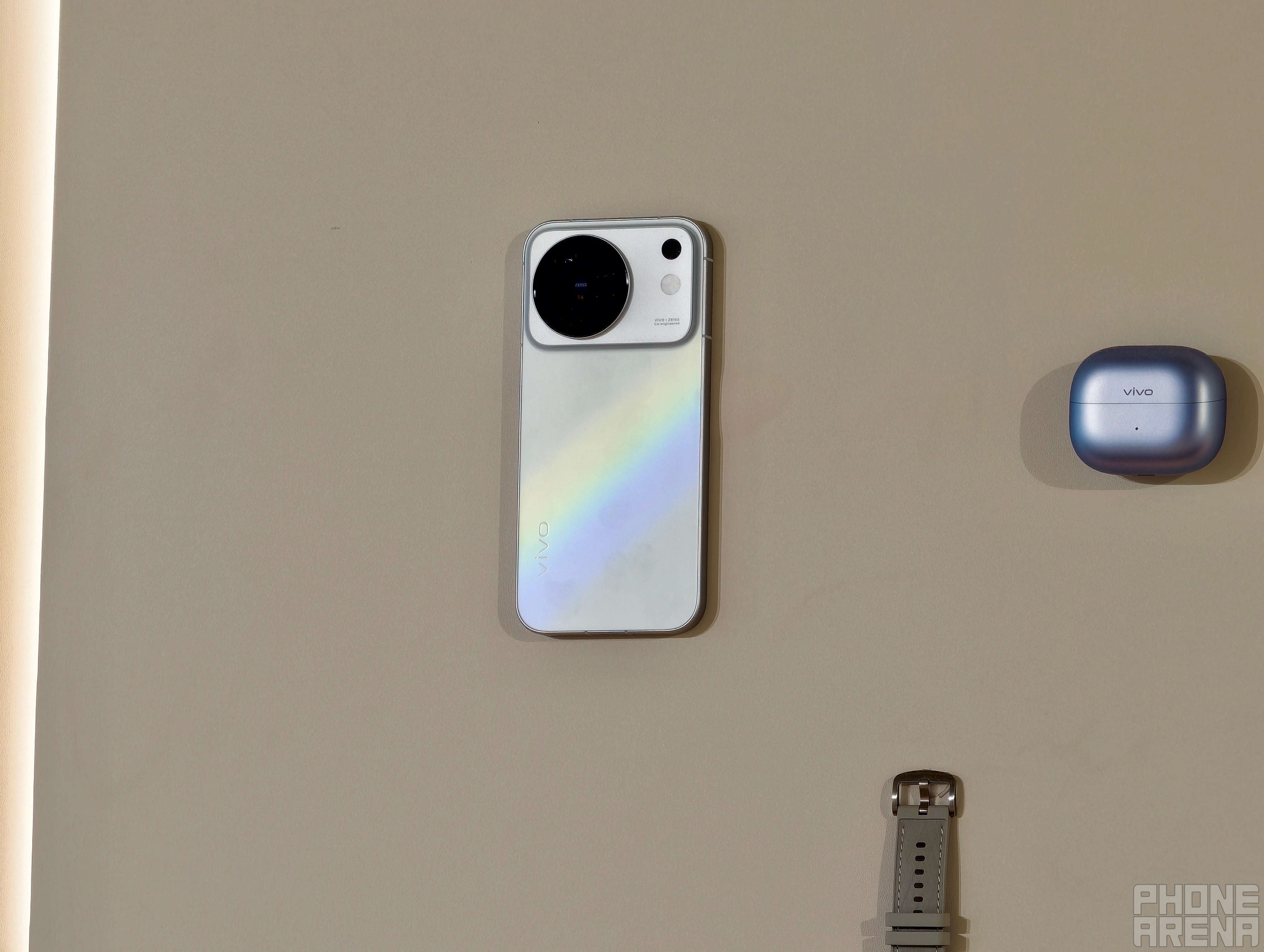 Vivo X500 in white has this cool rainbow effect | Image by PhoneArena - Vivo’s got a chokehold on cameras: Vivo X500 Pro Max hands-on
