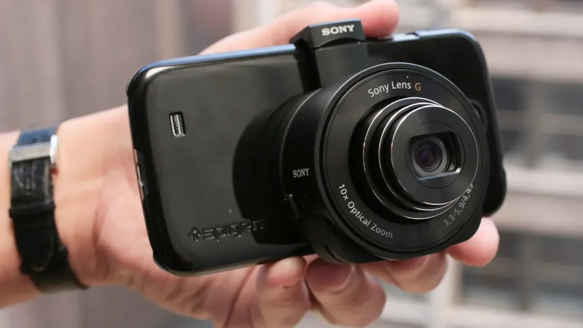 Sony's QX10 lens accessory. | Image by CNET - Forget the iPhone 18 Pro Max and the Galaxy S27 Ultra. This phone has a 1-inch external camera