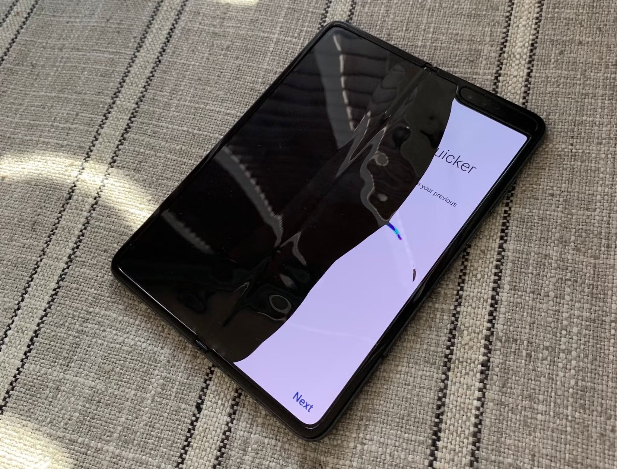 People tried to remove the original Galaxy Fold plastic screen layer, thinking it's just a normal screen protector. | Image by Android Central - The iPhone Duo solves a huge design flaw that plagues all other foldables