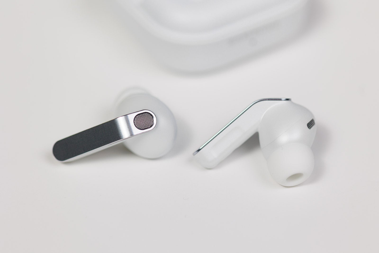 Galaxy Buds 4 Pro earbuds on a white table