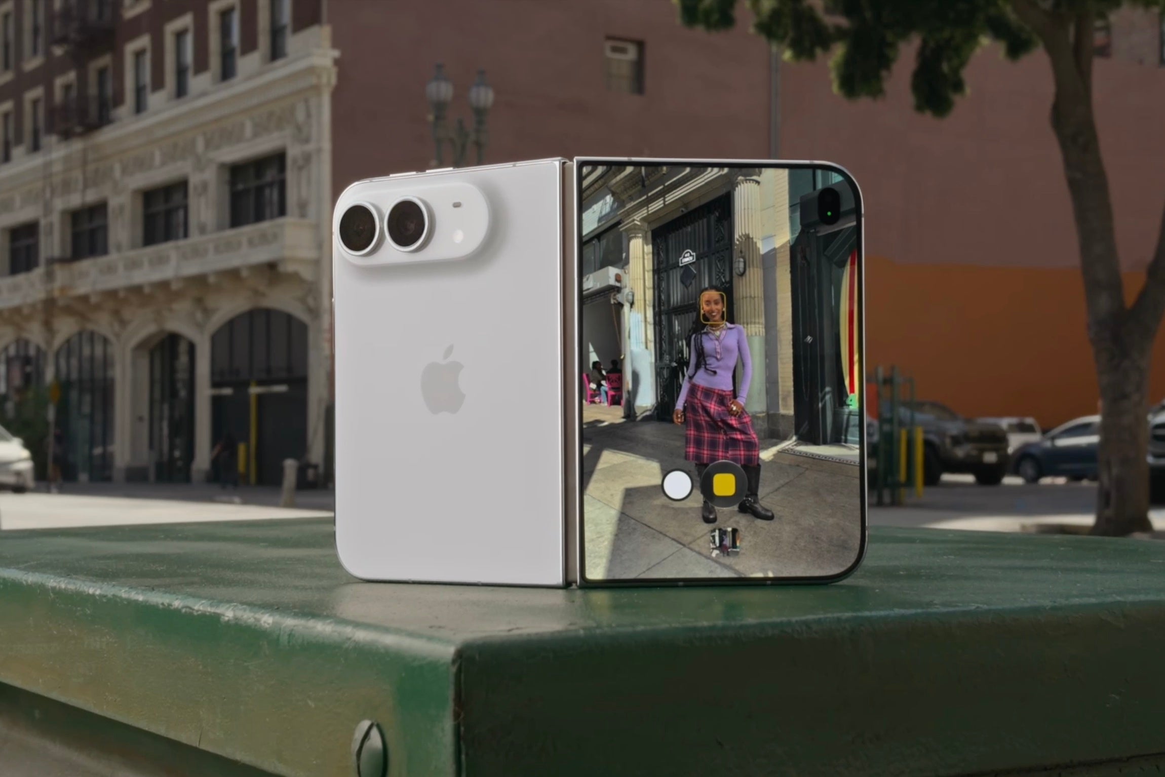 iPhone Duo half-open with the camera app on screen