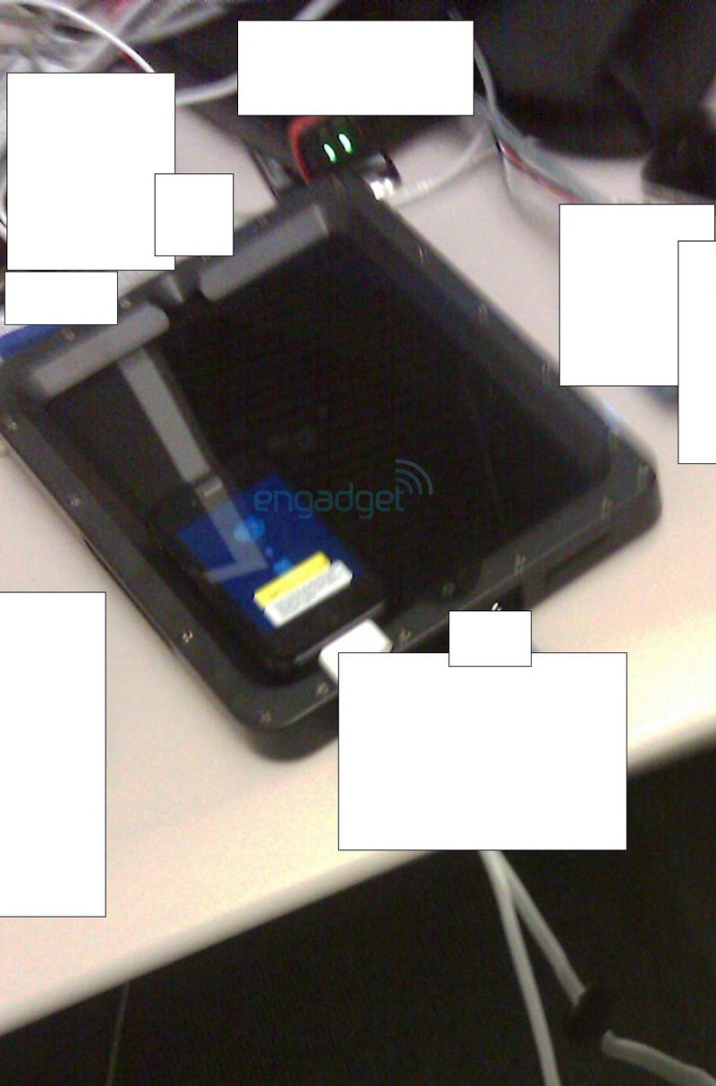 A blurry picture of a disguised Apple iPad - An Apple iPad developer spills the beans on Apple's security methods