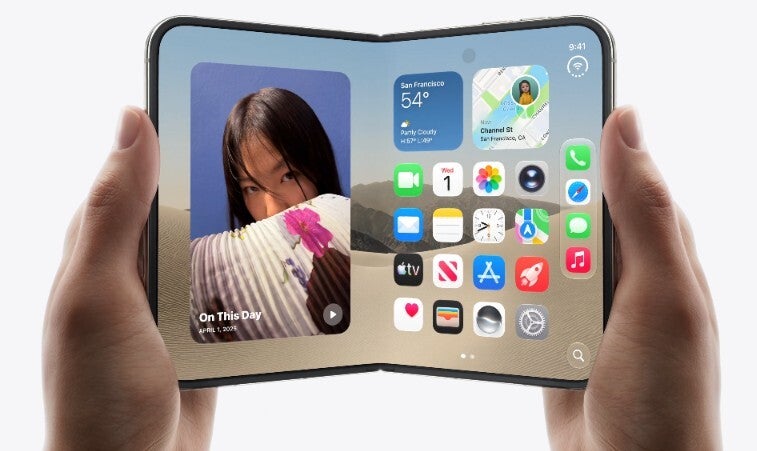 Image of someone holding a partially opened iPhone Duo.