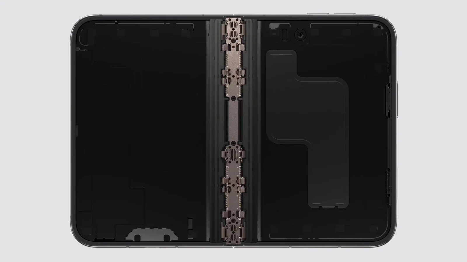 There's a central conduit with no moving parts and it houses all the cables and also the graphite heat pipe. | Image by Apple - iPhone Duo's crease and hinge explained &mdash; every innovation Apple baked inside its first foldable