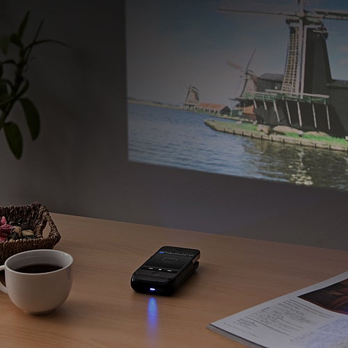 This micro iPhone projector brings 65-inch pictures to your wall, doubles as a battery pack