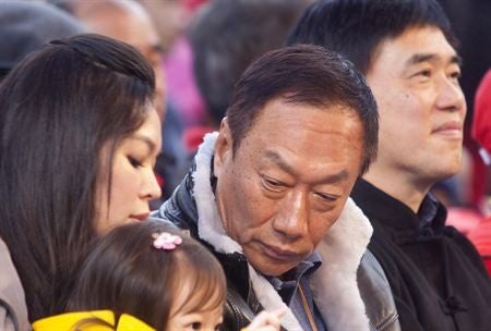 Terry Gou with his family at a charity event for the Taipei Zoo January 15 - Foxconn chief Terry Gou says people are animals, after all, and he has to deal with a million of them
