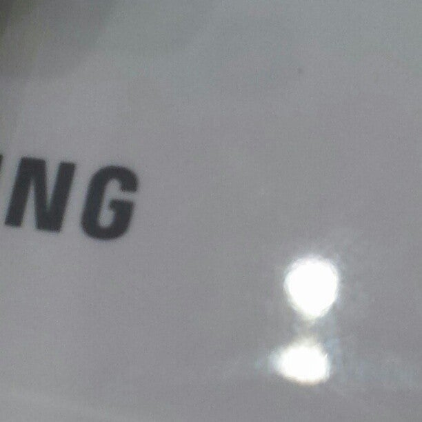 Samsung Unpacked app keywords refer to a Galaxy S3 title, fuzzy photo hints at the ceramic back