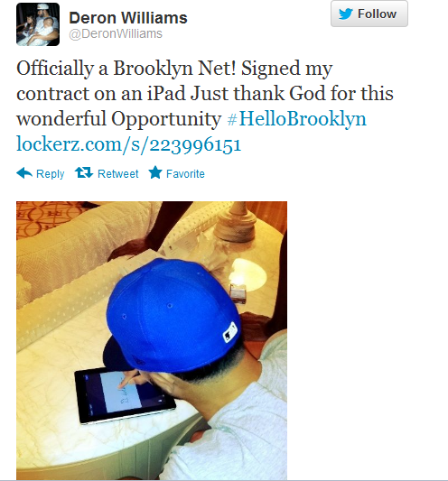 Deron Williams signing his contract on an Apple iPad - Brooklyn Net star Deron Williams uses an Apple iPad to sign $98 million contract