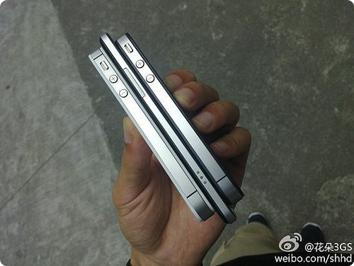 The Oppo Finder sandwiched between two Apple iPhones - World's thinnest smartphone doubles as a hammer