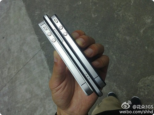 The Oppo Finder sandwiched between two Apple iPhones - World&#039;s thinnest smartphone doubles as a hammer