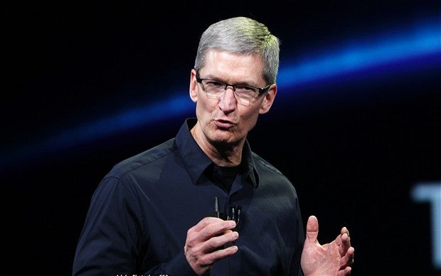 Apple CEO Tim Cook - Apple blames earnings miss on next Apple iPhone and weak economy