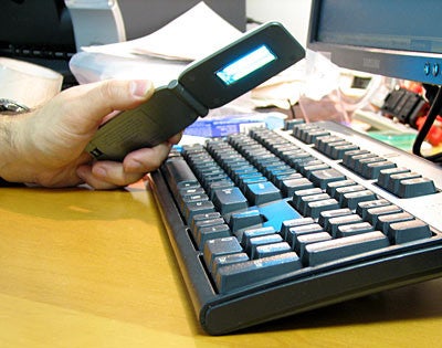 A UV disinfectant used to sanitize a keyboard - Our cell phones are covered with germs