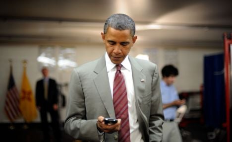 President Barack Obama and his once trusty BlackBerry - President Obama wins re-election, will preside over BlackBerry 10 era