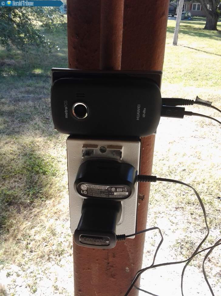 The outlet used by Kersey to charge his phone - Homeless man charges his phone in the park and gets busted