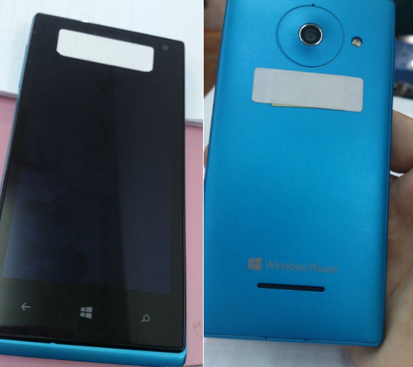 The phone in Nokia-ish cyan - The Windows Phone 8 Huawei Ascend W1 is pictured in color, in black and white