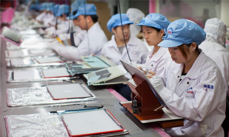 An assembly line in China - Apple: Only 1% of factory workers building our devices was overworked in January