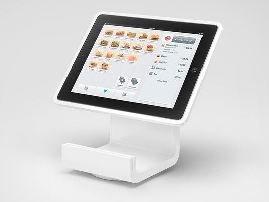 The Square Stand turns an Apple iPad into a POS system - Turn your Apple iPad into a POS device with Square Stand