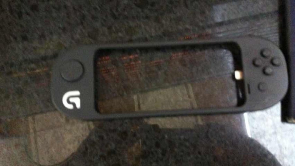 A leaked and blurry picture of a Logitech gamepad for the Apple iPhone 5 - Logitech to release iOS 7 gamepad for the Apple iPhone 5?