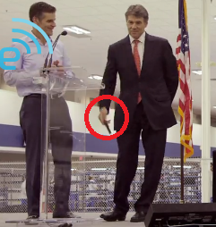 Texas Governor Perry is about to toss his Apple iPhone - Texas Govenor Perry tosses away an Apple iPhone at Motorola Moto X facility