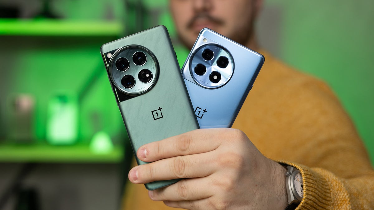 A person holding the OnePlus 12 and OnePlus 12R