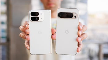 Person holding Google Pixel 9 Pro Fold and Pixel 9 Pro XL in his hands