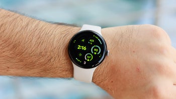 The Pixel Watch 3 in White, strapped to a male hand.