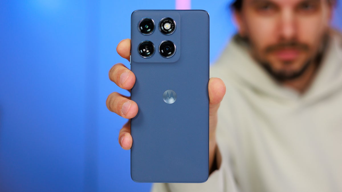 Man showing phone to the camera.
